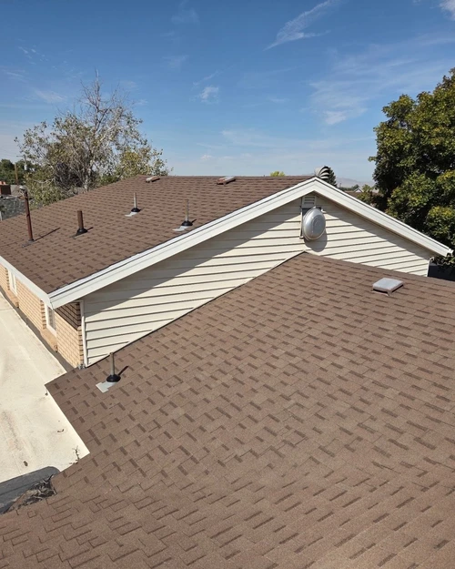 Aging asphalt shingle roof on a Utah home before rejuvenation