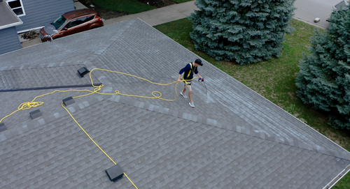 Roof rejuvenation work on a Utah home